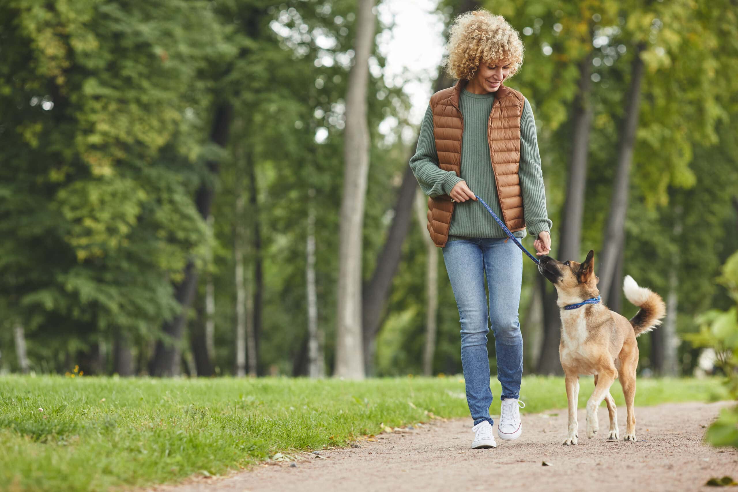 Woman walking with dog
