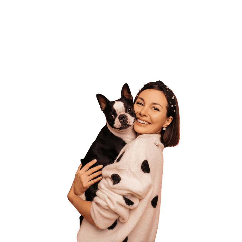 woman holding boston terrier